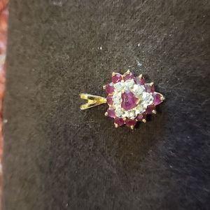 Natural Ruby and diamond heart-shaped pendant, 10k yellow gold
